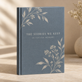 Illustrative celebration of life memory book cover mockup in slate blue and cream